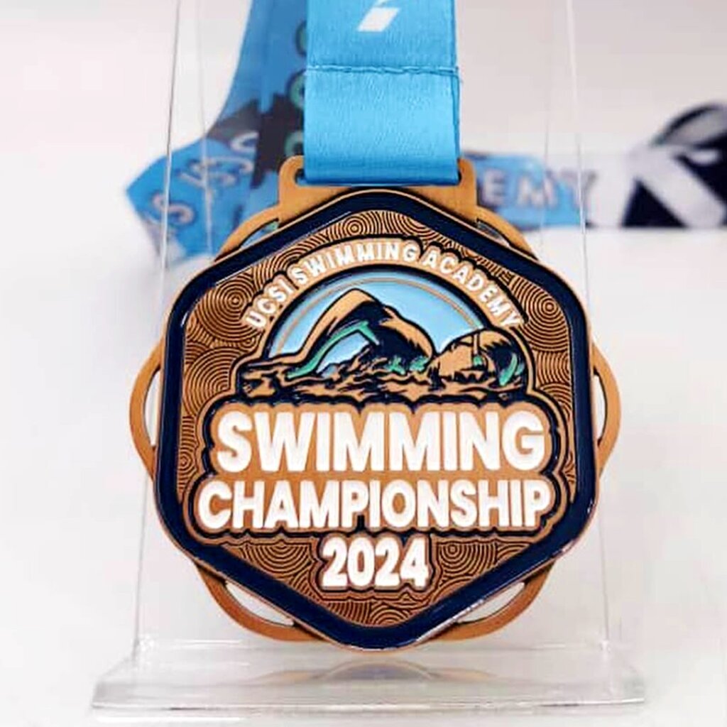swimming champion medal