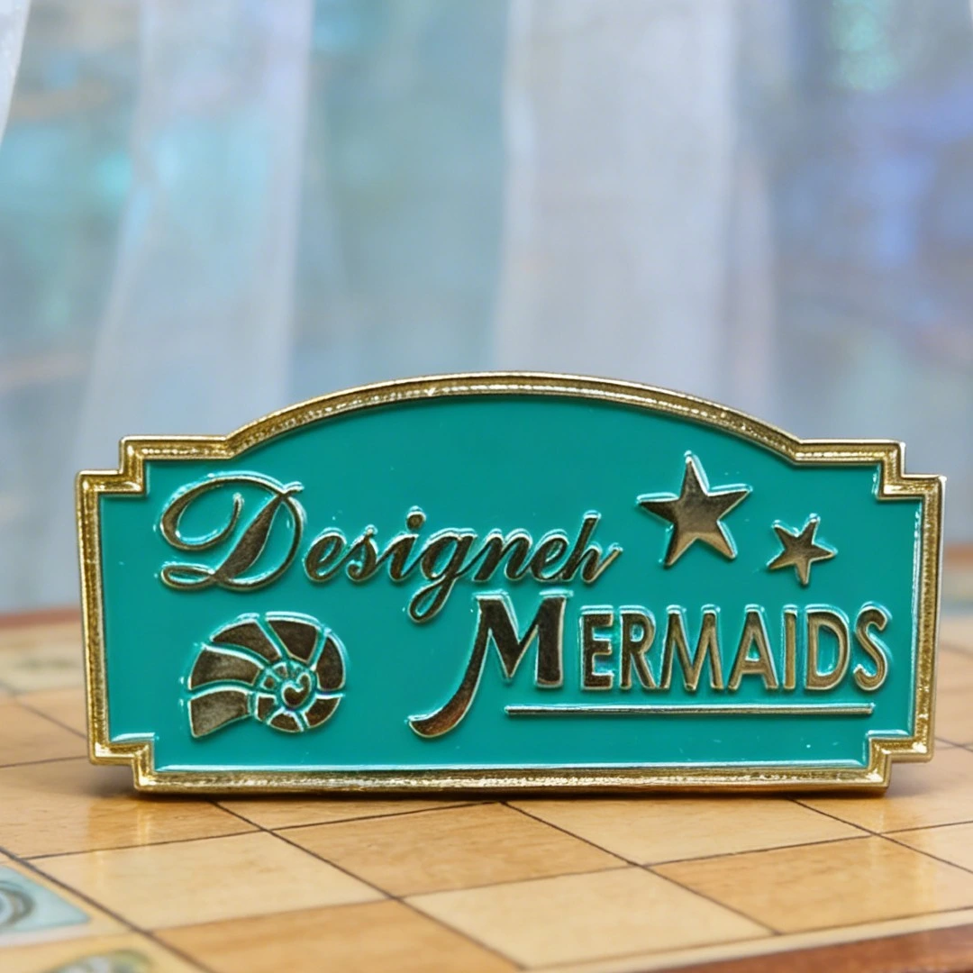 designel mermaids logo soft enamel pin